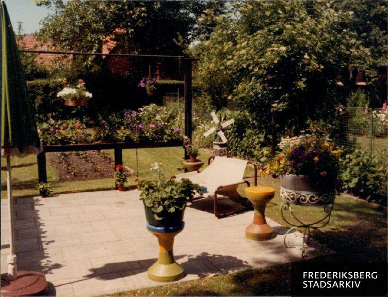 Terrasse med blomster i Haveforeningen Dalgas